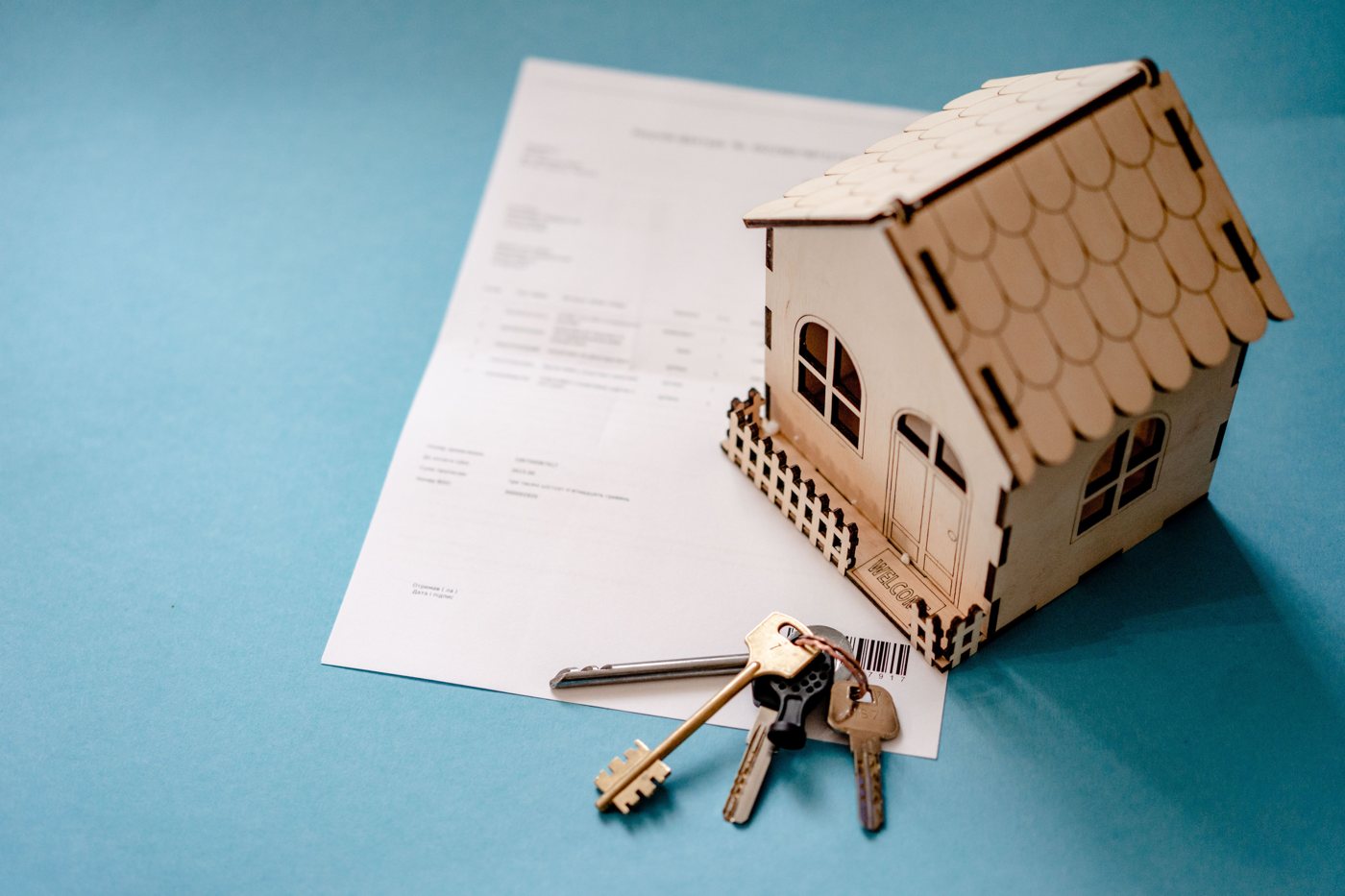 House keys and a signed purchase agreement